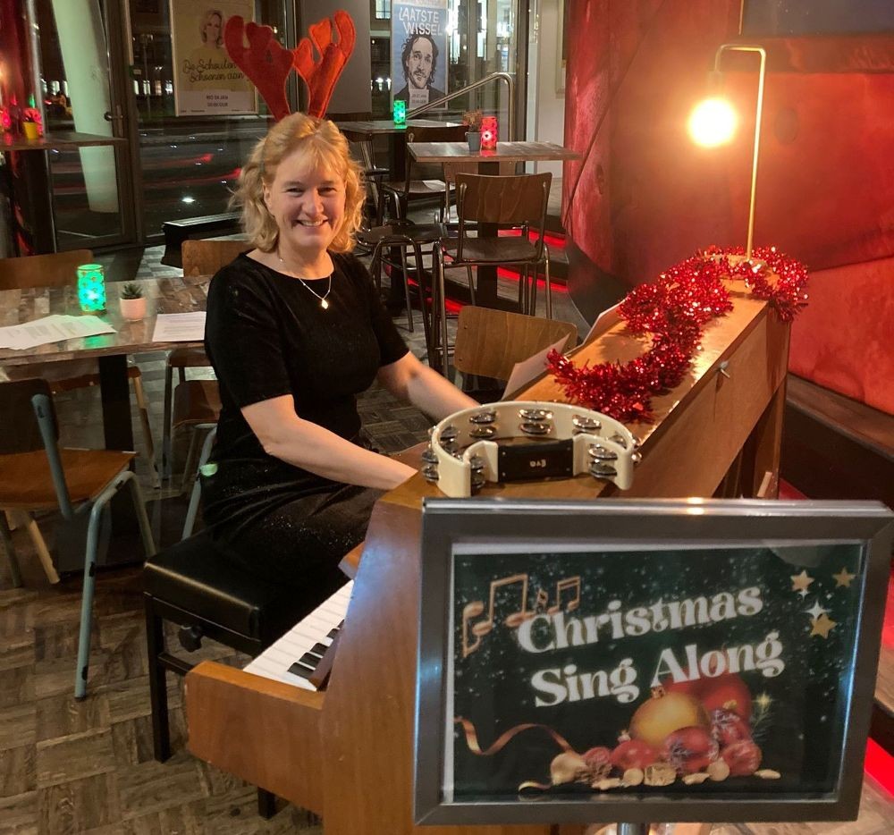 Jose piano bij kerstfeest